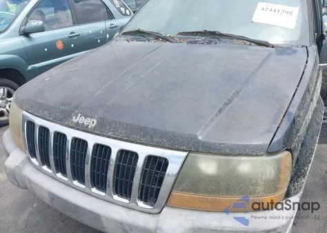 1999 Jeep Grand Cherokee Laredo from USA, damaged, VIN 1J4GW58S1XC525412